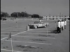Teenagers_Drive_Cars_through_an_Obstacle_Course__ca__1950s